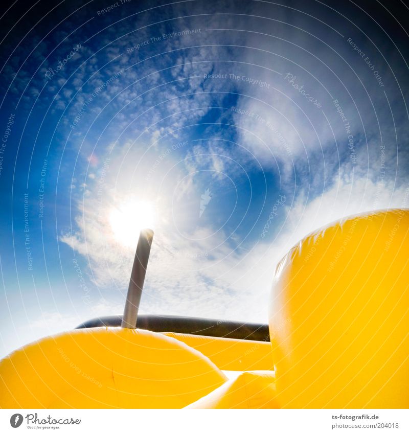 yellow fellow II Amusement Park Sky Clouds Sun Sunlight Weather Beautiful weather bouncy castle Large Round Soft Blue Yellow Black White Inflated Fat plump