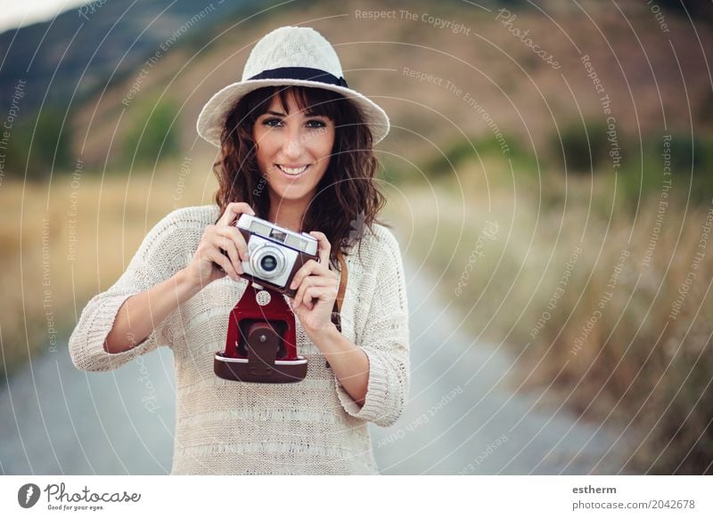 Smiling girl with camera in the field Lifestyle Leisure and hobbies Vacation & Travel Trip Adventure Sightseeing Camera Human being Feminine Young woman