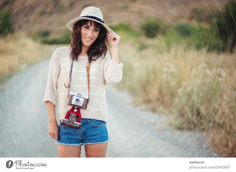 Smiling girl with camera in the field Lifestyle Vacation & Travel Tourism Trip Adventure Freedom Sightseeing Summer Summer vacation Camera Human being