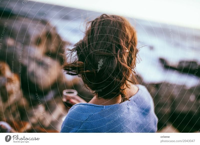 Back view of woman looking on ocean Drinking Lifestyle Beach Ocean Waves Human being Feminine Young woman Youth (Young adults) Woman Adults Hair and hairstyles