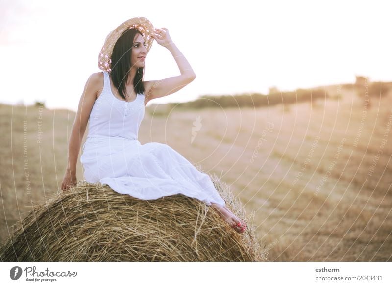 Smiling girl sitting on the straw Lifestyle Elegant Style Beautiful Human being Young woman Youth (Young adults) Woman Adults Body 1 30 - 45 years Nature