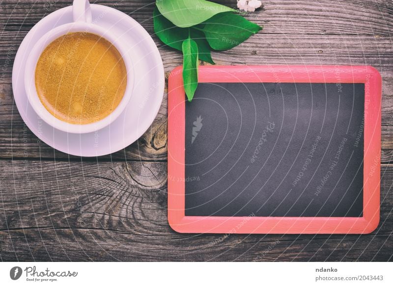 black chalkboard for the inscriptions Breakfast Coffee Espresso Desk Table Restaurant Blackboard Flower Wood Fresh Hot Above Retro White Café drink