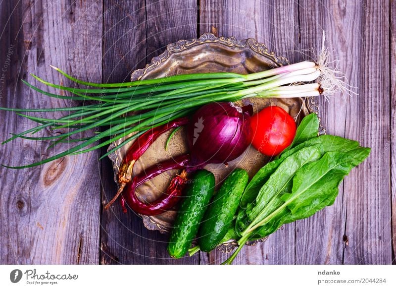 Fresh vegetables on an iron copper plate Food Vegetable Nutrition Vegetarian diet Diet Plate Kitchen Eating Delicious Natural Gray Green Red Tomato cucumber