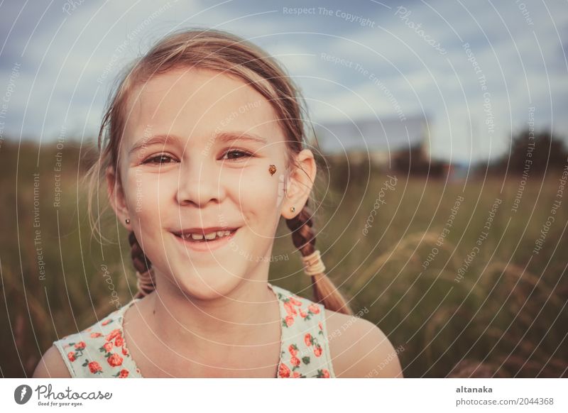 portrait of a beautiful young girl in park at the day time Lifestyle Joy Happy Beautiful Face Leisure and hobbies Playing Freedom Summer Sun Garden Child