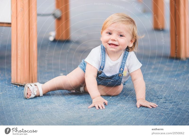 little baby on playground Lifestyle Playing Children's game Human being Feminine Baby Girl Infancy 1 0 - 12 months Smiling Laughter Sit Cuddly Small Funny