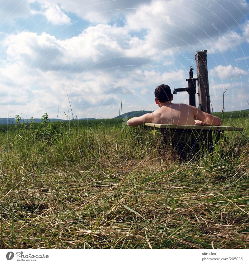 rural life Human being Young man Youth (Young adults) 1 Nature Clouds Summer Pasture Bathtub Hand pump Swimming & Bathing Relaxation Hot Joy