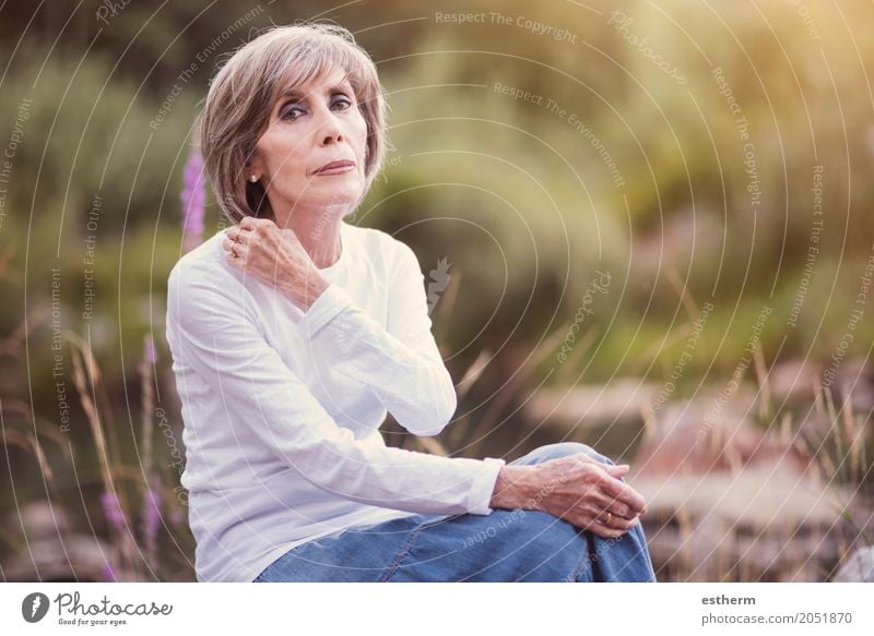 Happy senior woman sitting on the grass Lifestyle Elegant Style Wellness Well-being Human being Feminine Woman Adults Female senior Grandparents Senior citizen