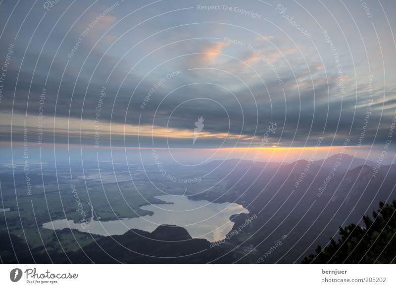 very early Lake Kochelsee Mountain lake Alps Sunrise Twilight Morning Europe Clouds Sky Bavaria Alpine foothills Herzogstand Orange Sunbeam Summer Water Nature