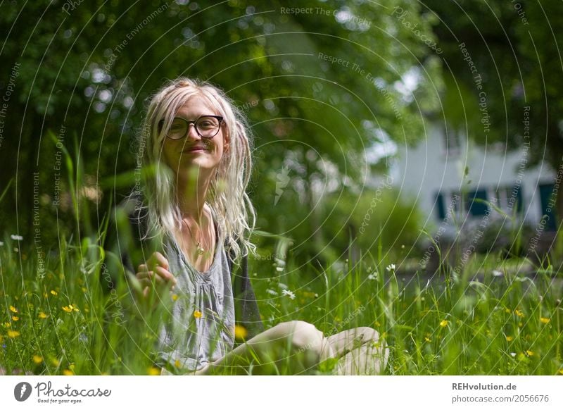 happy young woman sitting in a meadow Young woman Hair and hairstyles Nature Meadow Adults Environment 18 - 30 years Face Authentic Green Alternative Ecological