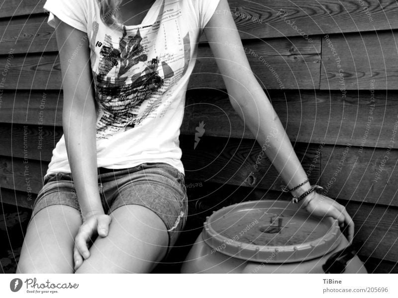 Milena Human being Feminine Young woman Youth (Young adults) Arm Legs 1 T-shirt Jeans Sit Calm Relaxation Black & white photo Exterior shot Evening Contrast