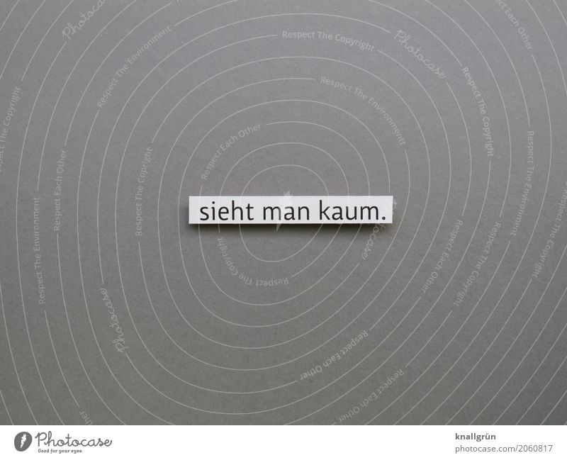 You can hardly see it. Small Seldom Text inconspicuous perception blurriness Diminutive Letters (alphabet) Word leap letter communication Language Typography