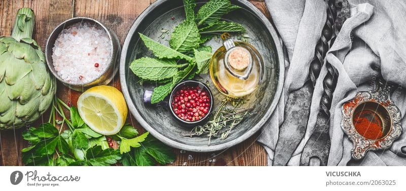 Fresh kitchen herbs and spices on a rustic kitchen table Food Herbs and spices Cooking oil Nutrition Organic produce Vegetarian diet Diet Crockery Style Design