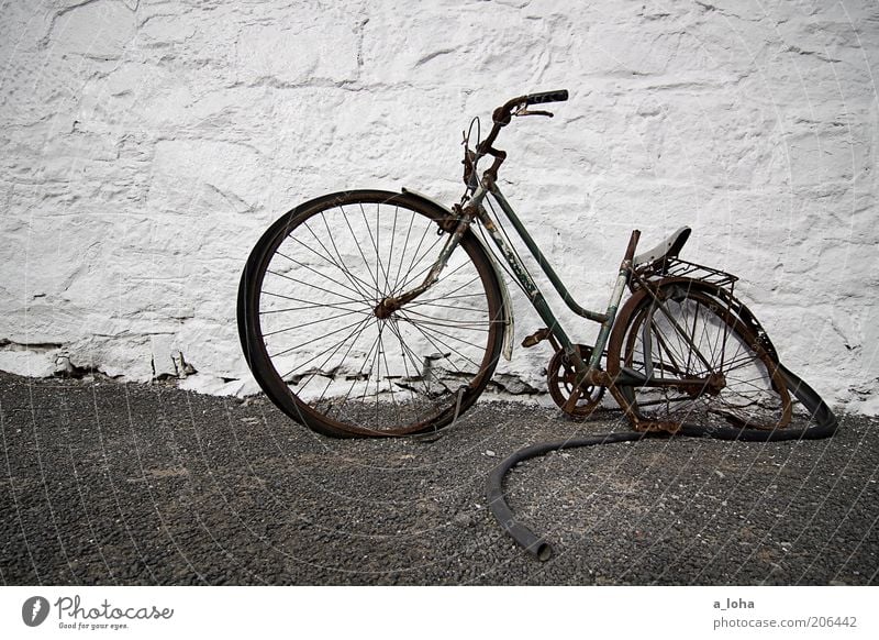 broken Bicycle Deserted Building Wall (barrier) Wall (building) Facade Lanes & trails Stone Old Stand Dirty Simple Broken Stagnating Decline Transience