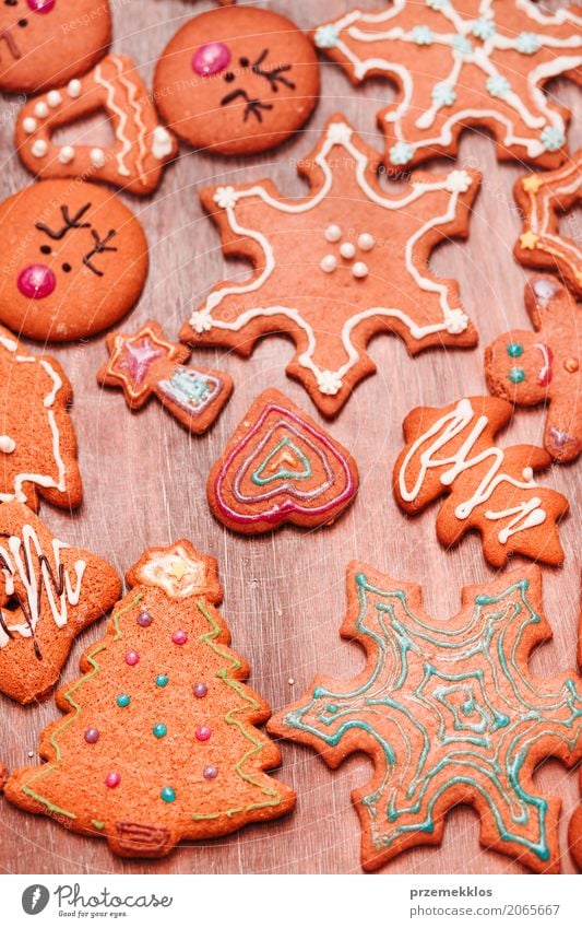 Christmas cookies decorated with frosting on wooden board Food Candy Decoration Table Feasts & Celebrations Christmas & Advent Wood Make Tradition Baking