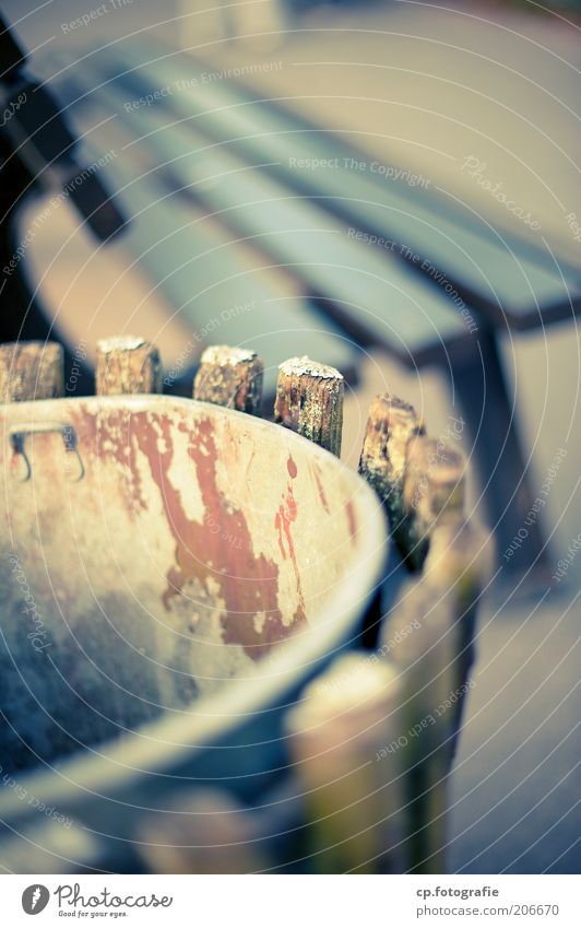 waste management Bench Trash container Deserted Blur Park bench Exterior shot Shallow depth of field Detail Section of image