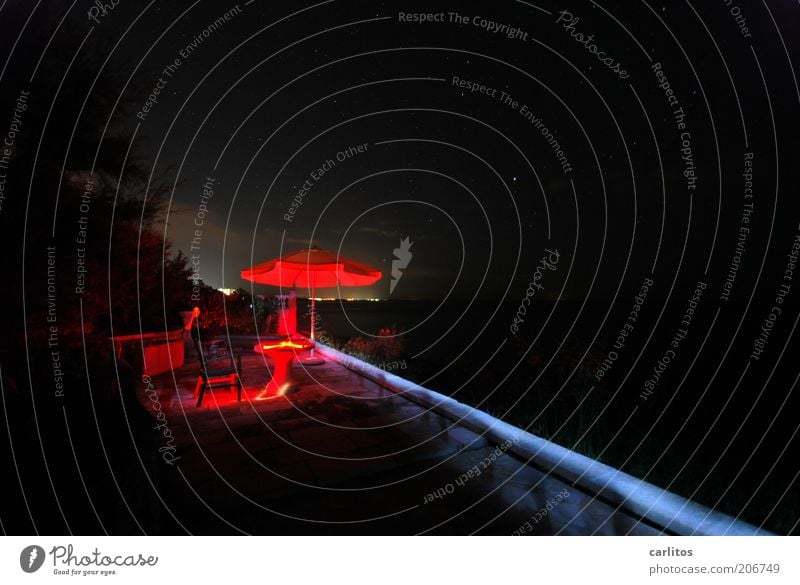 In the heat of the night ....... Vacation & Travel Summer Summer vacation Terrace Illuminate Esthetic Dark Bright Uniqueness Red Black Sunshade Table Diagonal