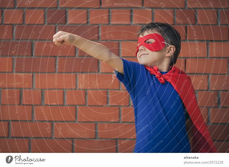 Happy little child playing superhero. Kid having fun outdoors Lifestyle Joy Beautiful Playing Vacation & Travel Adventure Freedom Summer Hallowe'en Success