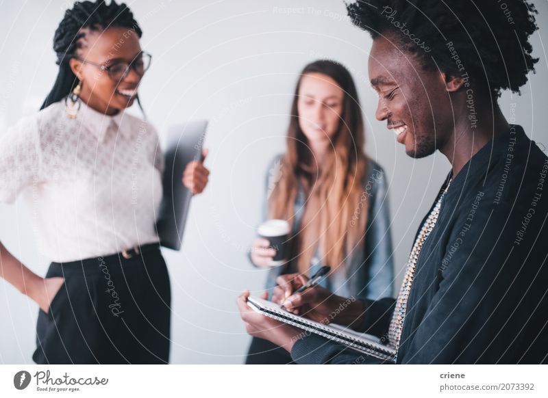 Mixed race group of businesspeople brainstorming in meeting Lifestyle Joy Success Work and employment Office Financial Industry Business SME Career Meeting