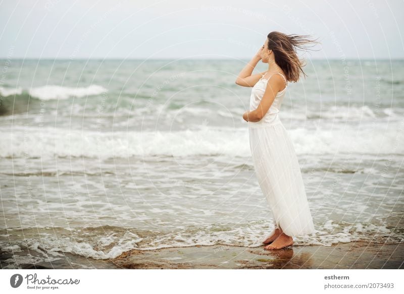 Pensive woman on the beach Lifestyle Elegant Exotic Beautiful Wellness Relaxation Vacation & Travel Trip Freedom Summer Human being Feminine Young woman