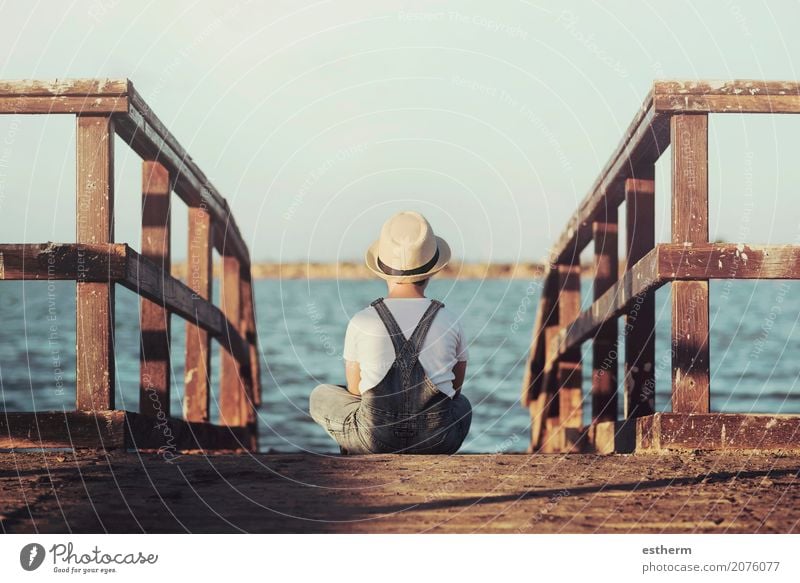 Pensive boy looking at the sea Lifestyle Vacation & Travel Adventure Freedom Human being Masculine Child Toddler Boy (child) Infancy 1 3 - 8 years Coast Beach