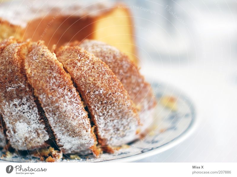 Grandma's Cake II Food Dough Baked goods Nutrition Delicious Sweet Confectioner`s sugar Gugelhupf Self-made Crumbs Colour photo Interior shot Close-up Deserted