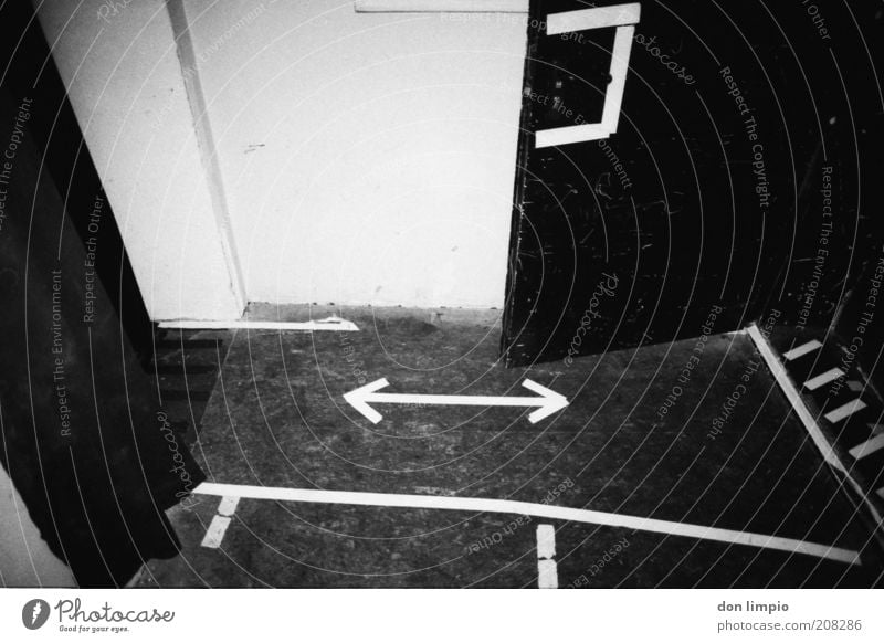 backstage Interior design Subculture Door Hallway Sign Signs and labeling Arrow Stripe Black White Analog Black & white photo Interior shot Deserted