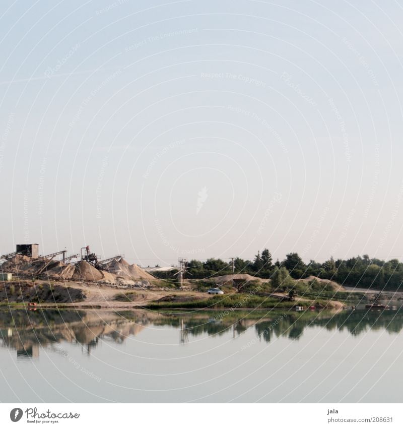 quarry pond Workplace Industry Nature Landscape Sky Lake Blue Pebble Sandbank Colour photo Exterior shot Deserted Copy Space top Copy Space bottom Morning