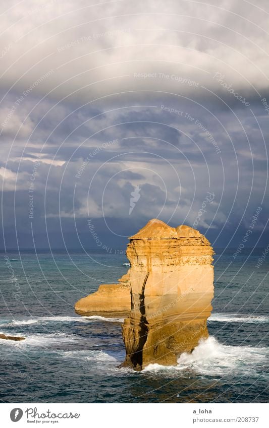 the rock Elements Sky Storm clouds Horizon Sunlight Bad weather Wind Rock Waves Coast Ocean Movement Stand Exceptional Dark Gigantic Tall Wet Natural Wild