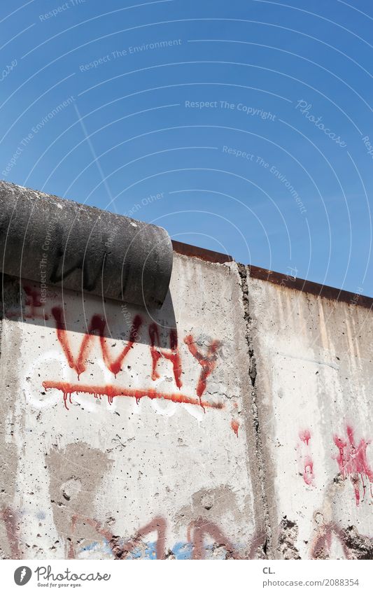 Why Sky Cloudless sky Beautiful weather Berlin Capital city Wall (barrier) Wall (building) Tourist Attraction The Wall Characters Graffiti Old Infinity