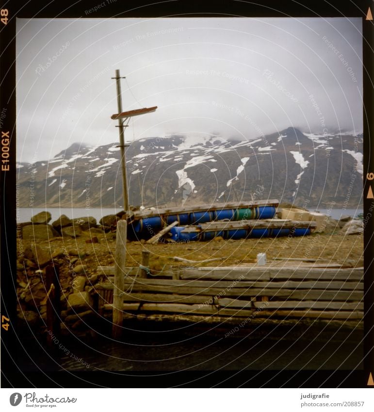 Iceland Environment Nature Landscape Water Sky Clouds Climate Rock Mountain Snowcapped peak Ocean Djúpavík Village Deserted Harbour Wood Exceptional Dark Cold