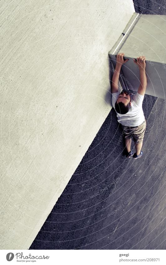 hangin' around II Climbing Human being Masculine Man Adults 1 Concrete wall Concrete floor Tar Column Carrier T-shirt Shorts Brunette Facial hair To hold on