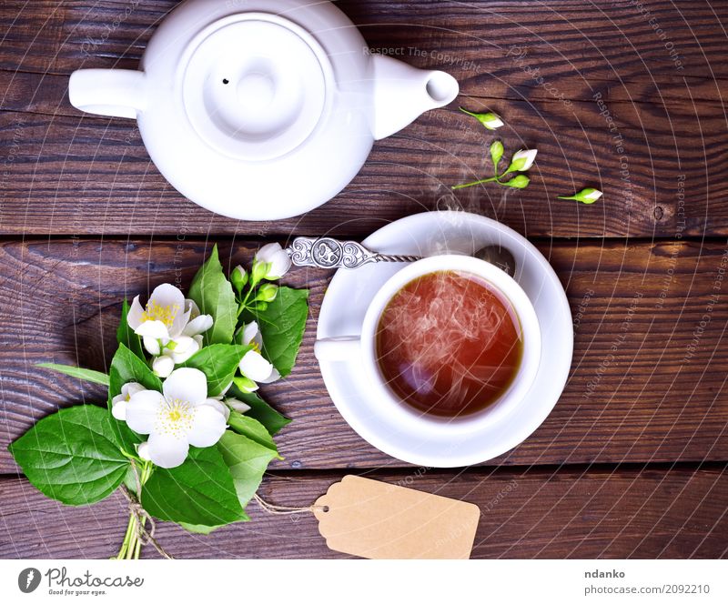 cup of black tea Breakfast Tea Mug Table Flower Leaf Paper Bouquet Wood Fresh Hot Brown Green White Tradition Jasmine drink food tag Top background blank space