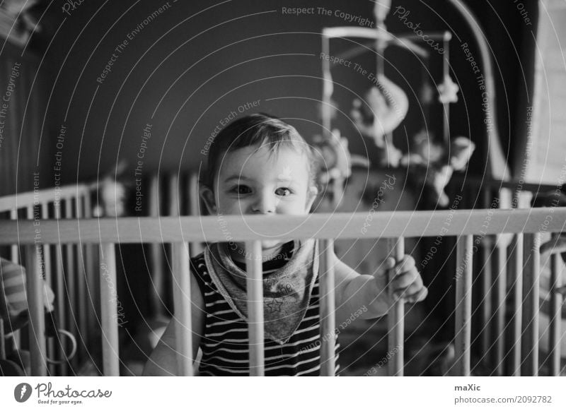 playpen Human being Masculine Child Baby Toddler Boy (child) Infancy 1 0 - 12 months Looking Stand Black & white photo Blonde Eyes Laughter Grating