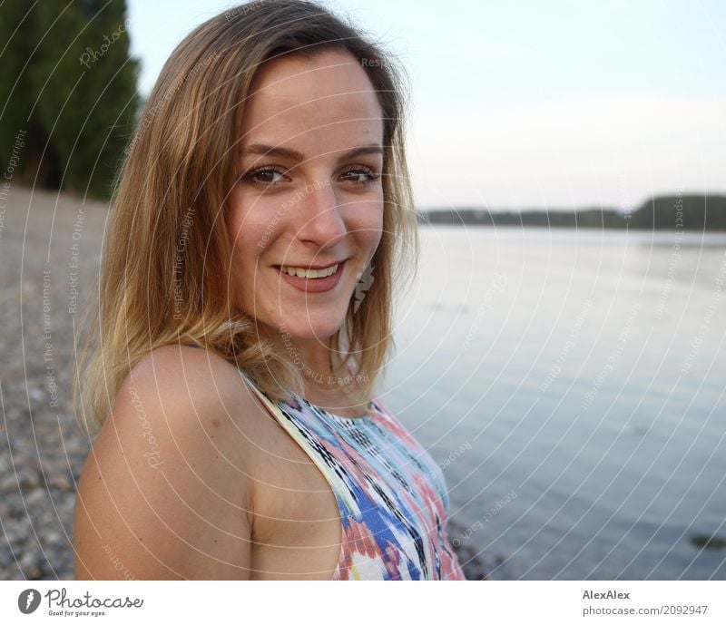 Young woman on the banks of the Rhine smiles into the camera Lifestyle Happy pretty Trip Youth (Young adults) Face 18 - 30 years Adults Nature Landscape Water