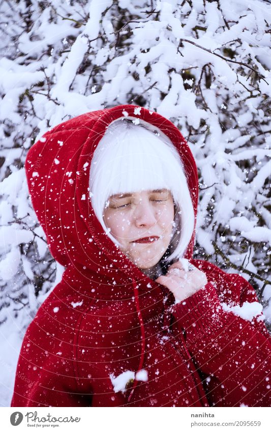 Young woman enjoying a snow battle Lifestyle Face Vacation & Travel Tourism Adventure Winter Snow Winter vacation Human being Feminine Youth (Young adults) 1