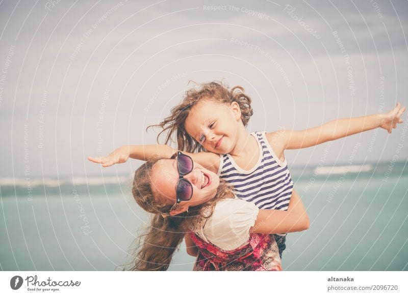 Sister and brother playing on the beach Lifestyle Joy Happy Beautiful Relaxation Leisure and hobbies Playing Vacation & Travel Freedom Summer Sun Beach Ocean