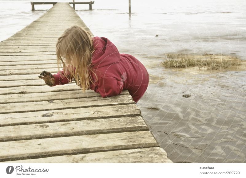 the child and the sea ... Child Girl Infancy 3 - 8 years Environment Elements Water Bad weather Coast Beach North Sea Ocean Dike Sand Curiosity Gloomy