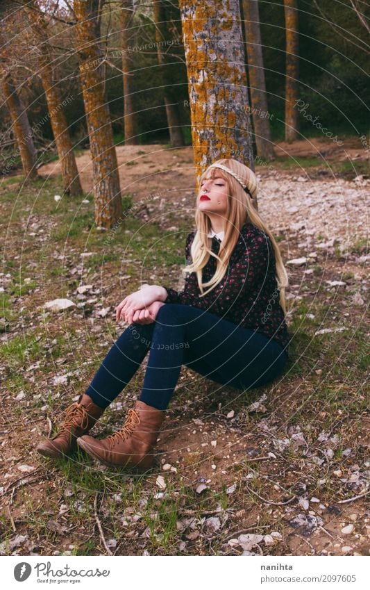 Young hippie woman sitting in a forest Lifestyle Wellness Harmonious Relaxation Calm Vacation & Travel Tourism Adventure Human being Feminine Young woman