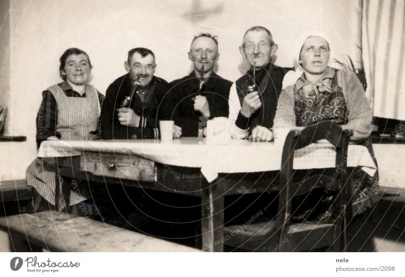 happy without a word Village Tradition Table Headscarf Photography Human being Old Smoking Past Feasts & Celebrations Whistle Grandfather Grandmother