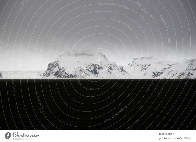 White Rocks Black Lava Environment Nature Landscape Winter Bad weather Mountain Snowcapped peak Iceland Colour photo Exterior shot Day Contrast