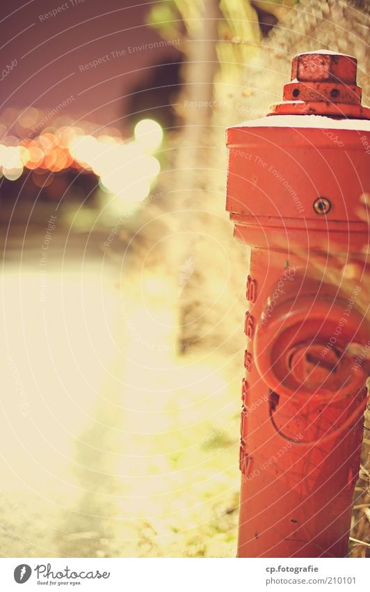 water absorption Fire hydrant Blur Metal Cold Exterior shot Night Artificial light Long exposure Shallow depth of field Fire prevention Copy Space left