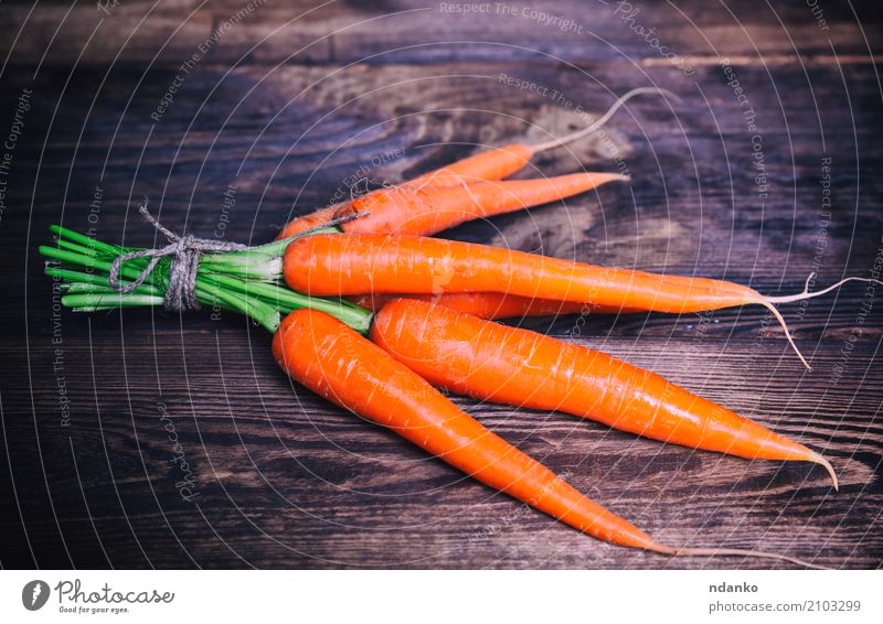 Fresh carrots tied with a rope Vegetable Nutrition Eating Vegetarian diet Diet Table Nature Plant Leaf Wood Natural Green ripe Useful agriculture iron Organic