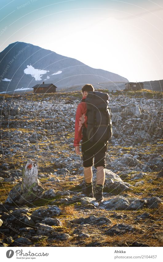 Young man on his way to a hut in Norway Athletic Vacation & Travel Adventure Mountain Hiking Youth (Young adults) Landscape Rock Hut Signs and labeling