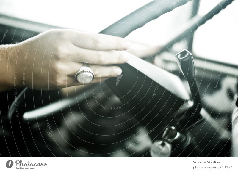 Maria steers the bus Feminine Hand Fingers Steering Steering wheel Ring Natural Car Driving Transport Interior shot Shallow depth of field Women`s hand Motoring