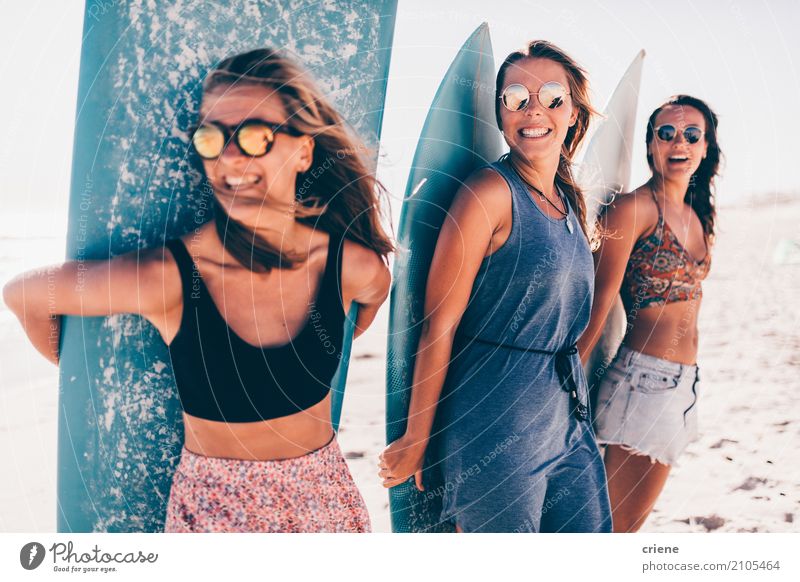 Group of young woman having fun at the beach with surfboards Joy Happy Relaxation Leisure and hobbies Vacation & Travel Adventure Summer Sun Beach Human being