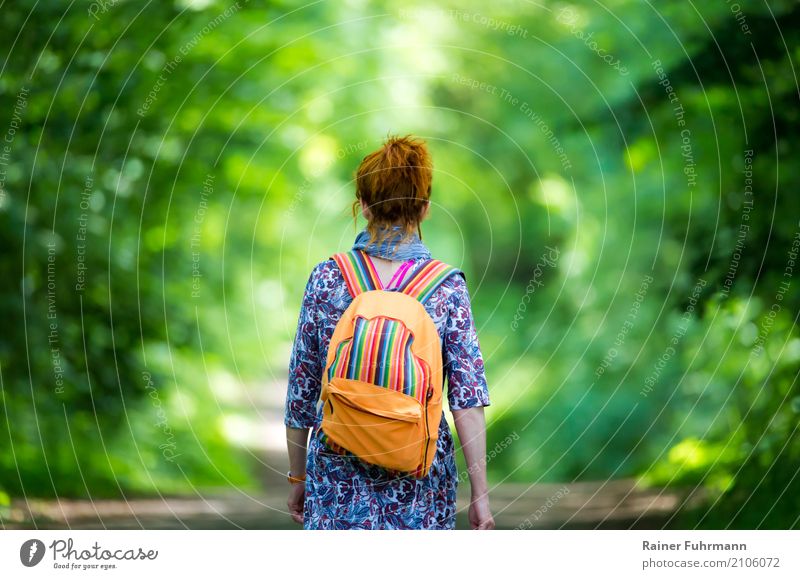 a woman goes her way alone Human being Feminine Woman Adults Environment Nature Plant Spring Summer Forest Street Lanes & trails Going Hiking Uniqueness Moody