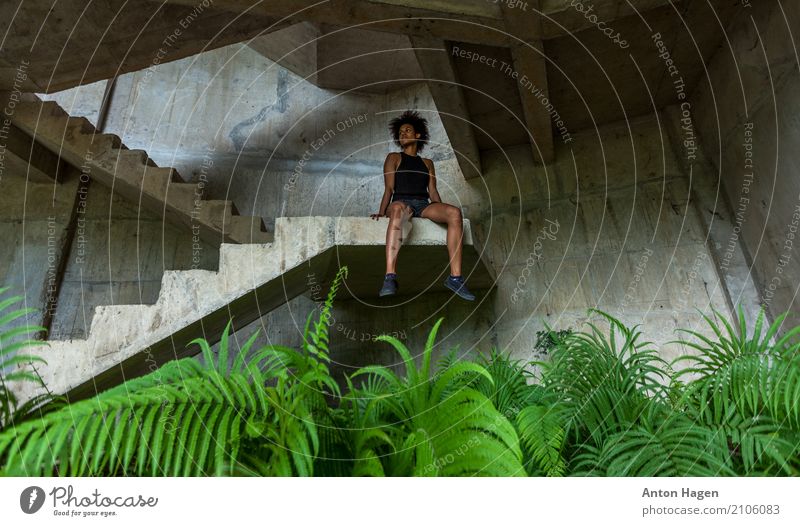 Melanesian girl inside abandoned hotel construction Fitness Sports Training Feminine Young woman Youth (Young adults) 1 Human being 18 - 30 years Adults