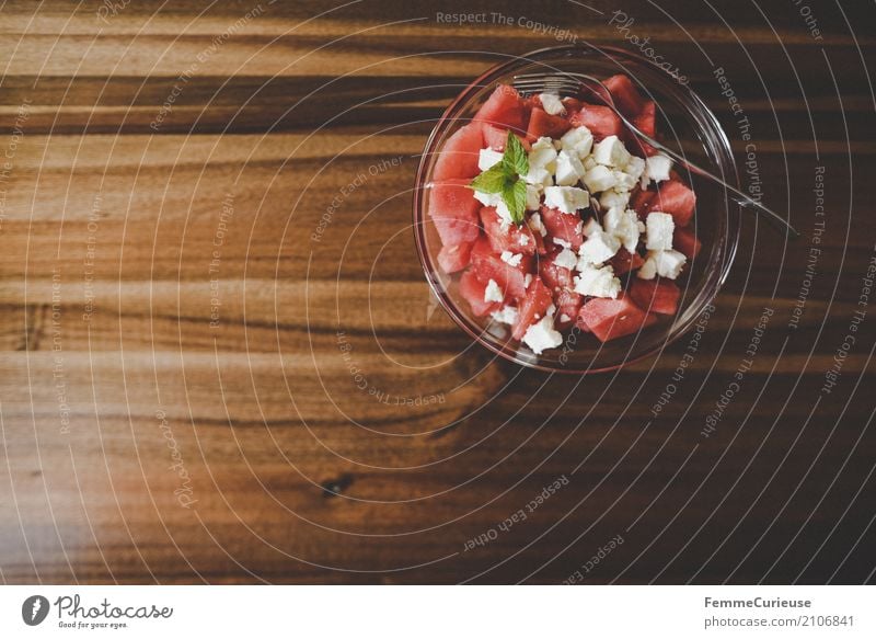 Home office (05) Food Nutrition Notebook Wooden table Melon feta Mint Lettuce Fork Glass bowl Healthy Eating Vegetarian diet Summery Snack Colour photo