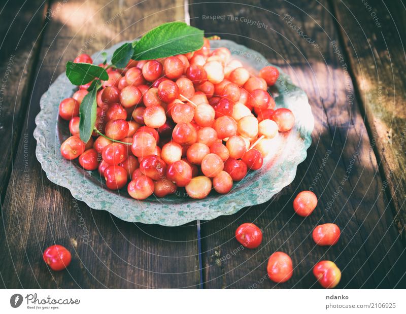 Ripe red cherry Fruit Dessert Vegetarian diet Plate Summer Garden Table Nature Wood Fresh Natural Retro Juicy Yellow Red background Berries Cherry food Harvest