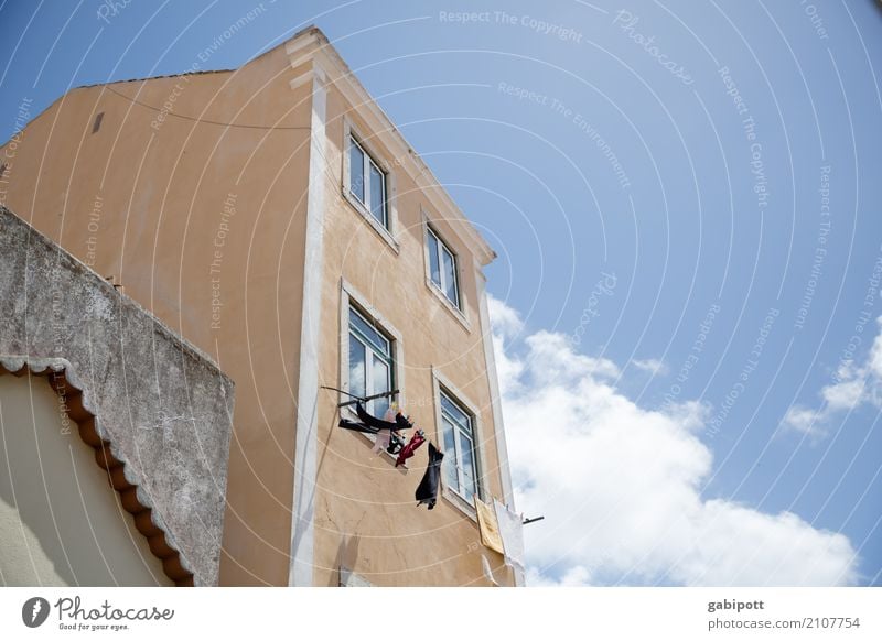 Small laundry Town Old town House (Residential Structure) Facade Window Contentment Idyll Portugal Clothesline Lisbon Blue sky Clouds Colour photo